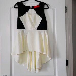 Like New. AKIRA Red Label Black And Cream Top